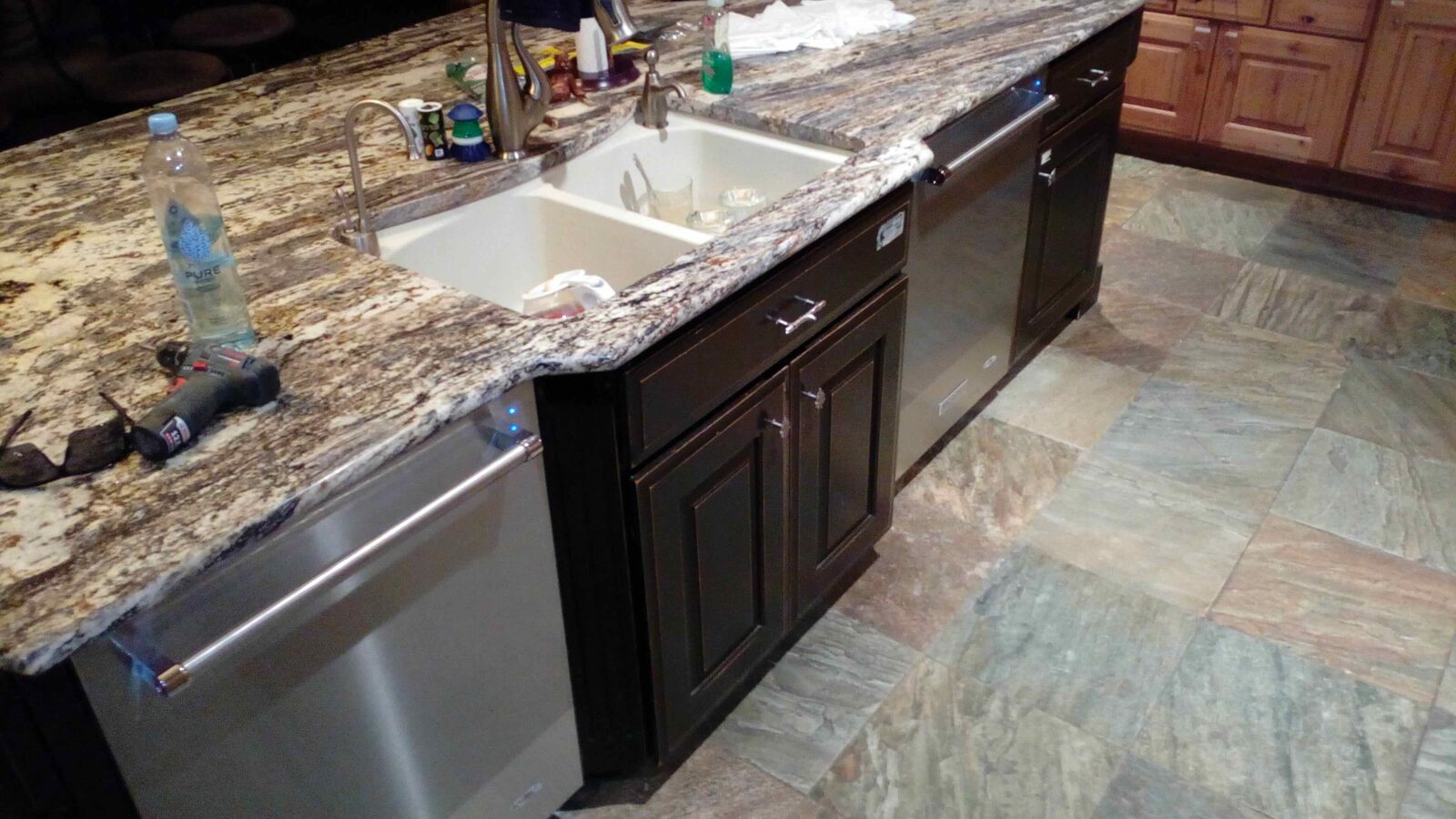 Finished cabinetry, granite, and slate.