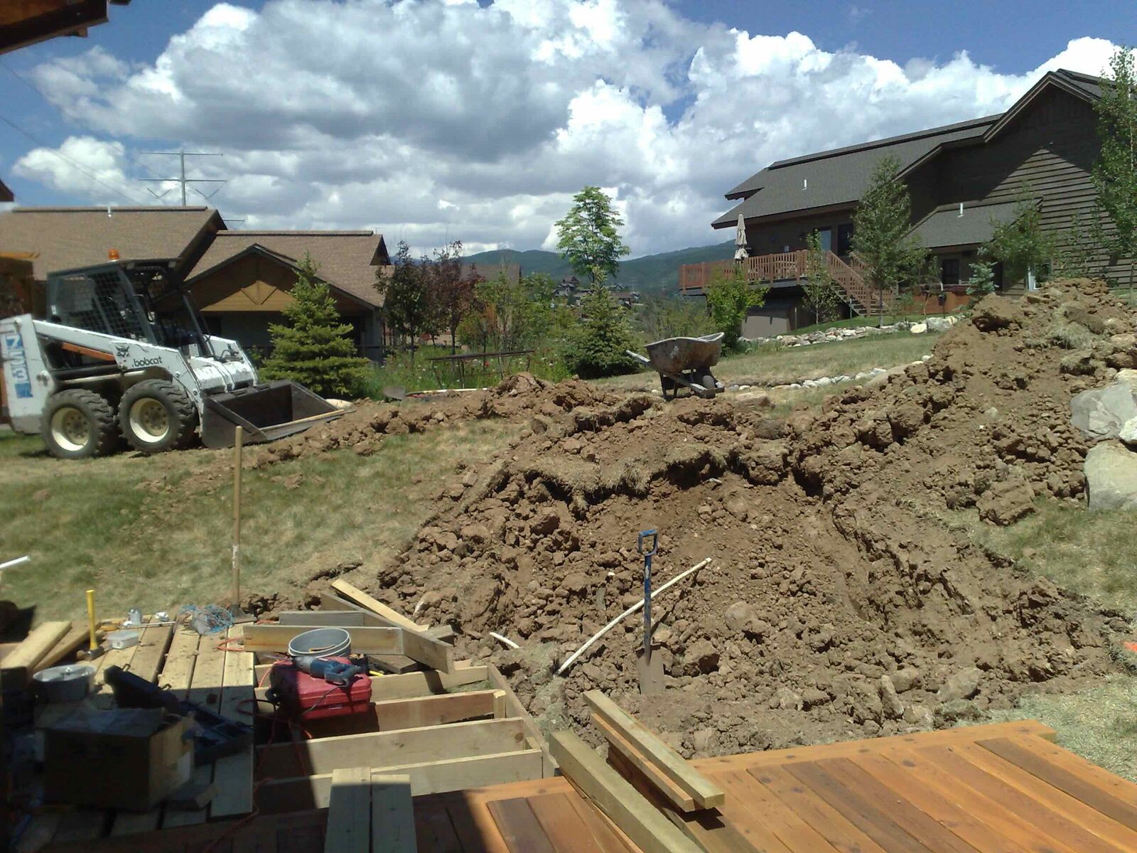 Before &mdash; excavating the sloped yard.