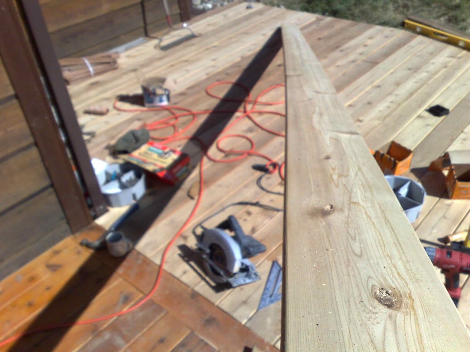 Fitting the cedar decking.