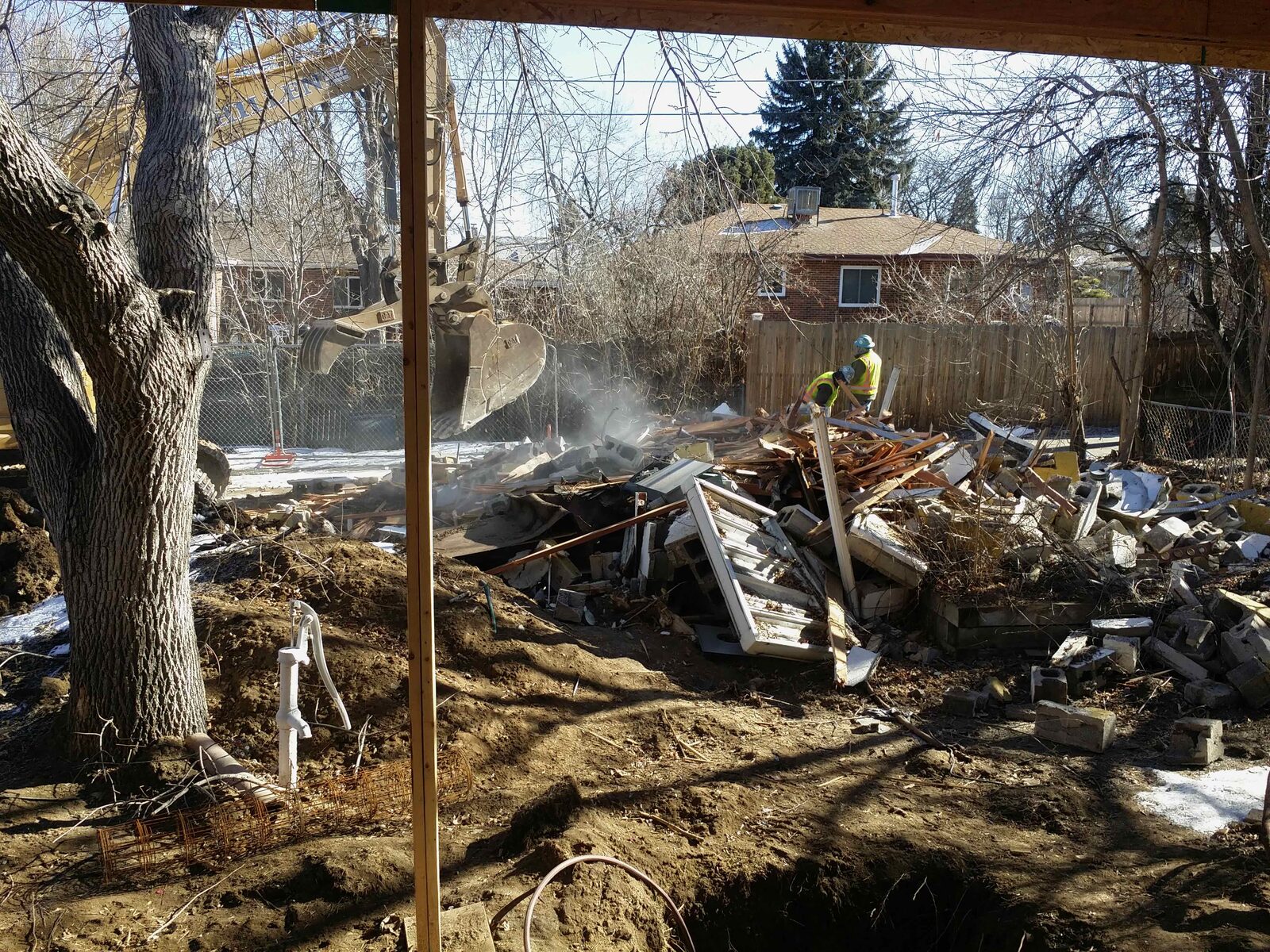 Demolishing the old structure.