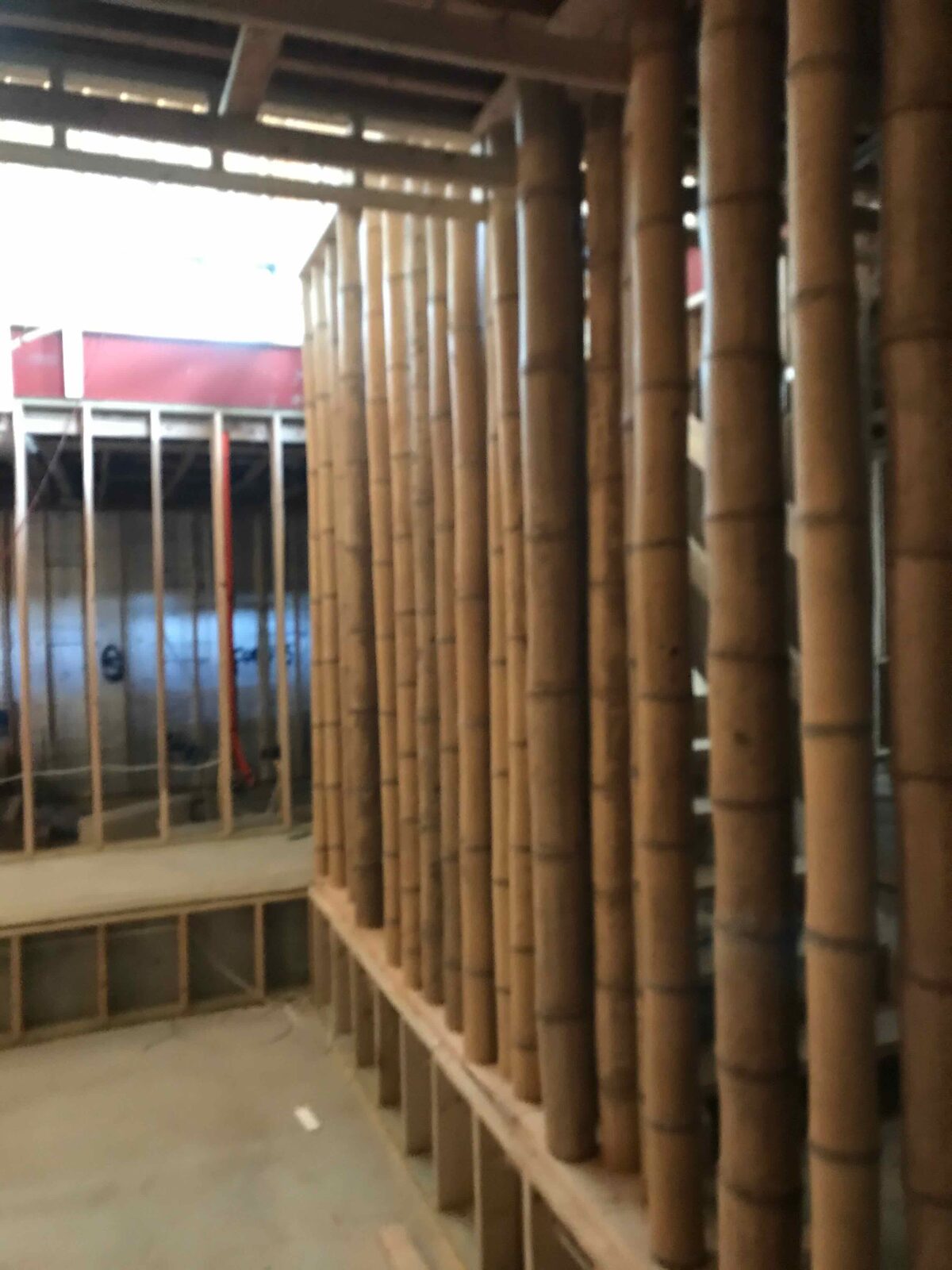 Bamboo poles set into the frame.